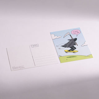 Cartoon postcard with a Grim Reaper on a skateboard and 'I love my job' speech bubble, next to a plain card.